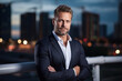 © Keitma - Portrait of a 40 years old man, light unshaven, casual business style with suit shirt but no tie , modern city background