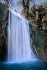 Wall Mural - Beautiful waterfall in wintertime, Spain