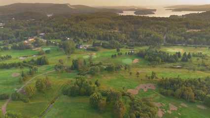 Wall Mural - Aerial view on a nice hole in the morning on a golf club in Quebec, Canada