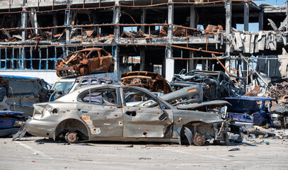 damaged and looted cars in a city in Ukraine during the war