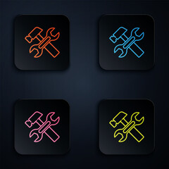 Poster - Color neon line Crossed hammer and wrench spanner icon isolated on black background. Hardware tools. Set icons in square buttons. Vector