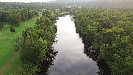 Wall Mural - Aerial view of a beautiful Canadian forest river in the province of Quebec