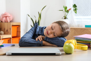 Wall Mural - Little girl sleeping after doing lessons at home