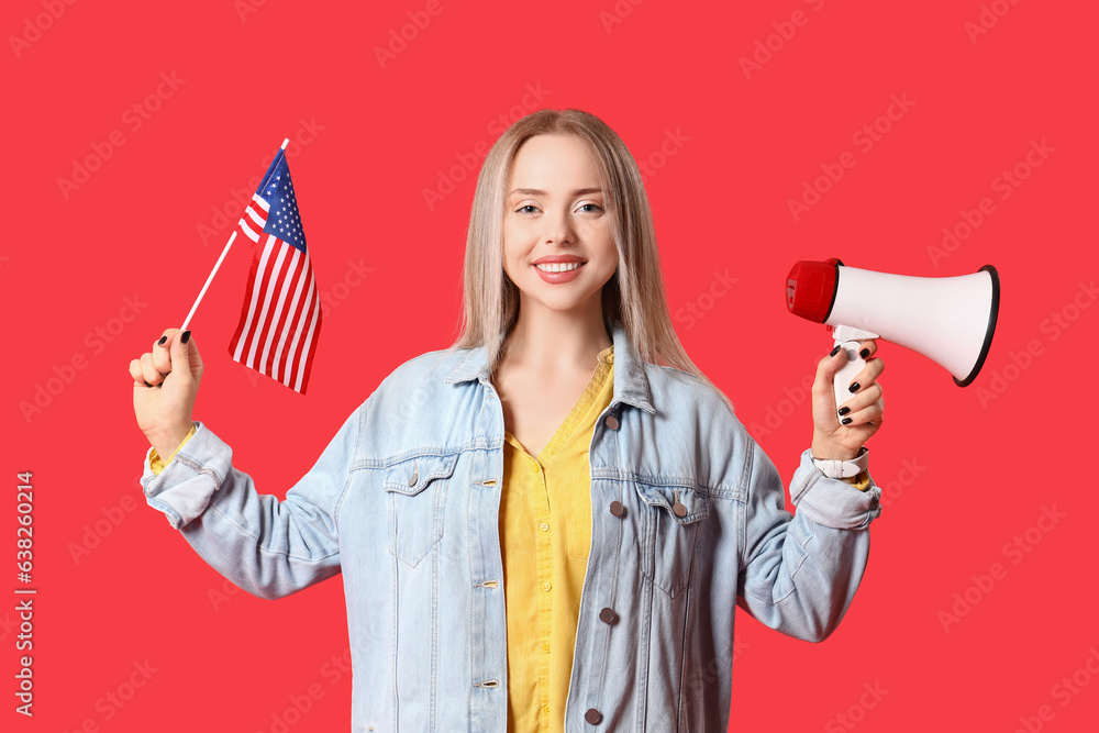 Young woman with USA flag and megaphone on red background
