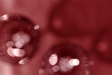 Wall Mural - glasses of red wine as blurred background, abstract backdrop red wine colored, natural light and dar