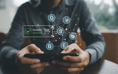 Currency exchange, money transfer, and online banking concept. Man using mobile phone and laptop computer with international currencies for interbank payment.