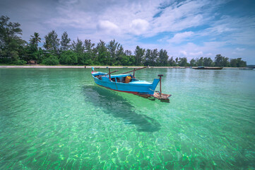 Wall Mural - Traditional long tail boat in the sea, Bintan Island, Indonesia