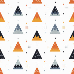 Autumn and winter seasonal seamless pattern with geomatics mountains shape background, yellow, orange, gray and black tone, greeting cards. wallpaper, gift paper, pattern fills, web page background.