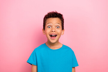 Canvas Print - Photo portrait of charming small boy astonished excited win lottery wear trendy blue garment isolated on pink color background