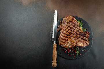 Canvas Print - T-bone or porterhouse beef meat Steak for steakhouse menu. banner, menu, recipe place for text