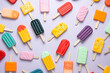 delicious colorful ice cream on the table, ice cream sticks of various flavors