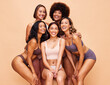 © Anela/peopleimages.com - Diversity, beauty and portrait of happy women with body positivity, self love and solidarity in studio together. Smile, group of people on beige background in underwear, skincare and makeup cosmetics