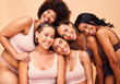 © Anela/peopleimages.com - Portrait, diversity and women with beauty, wellness and body positivity on a beige studio background. Models, friends or group with self love, inclusion and support with skincare, aesthetic and smile