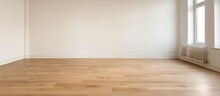 Freshly Renovated Room With Wooden Flooring In An Empty Apartment Building