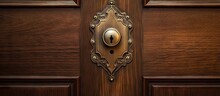 Close Up Of Wooden Door With Keyhole And Doorknob Visible