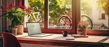 Bright Apartment With Garden View Featuring A Brown Chair Desk With Laptop And A Red Bicycle