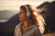 Caucasian sports woman listening to music on headphones outdoors