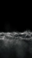 Wall Mural - abstract dotted black and white waves slow motion on clean copy space black vertical background. sea