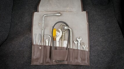 Poster - Tool kit for a car with a spare belt