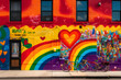 canvas print picture - Pride-themed street art mural with positive messages and icons. 