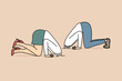 © Dzianis Vasilyeu - Business people hide heads in sand because of cowardice and fear problems caused by competition among employees. Business man and woman in pose of ostriches ignoring troubles due to lack of motivation
