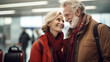 © Dirk - AI generated, photorealistic illustration, elderly couple with luggage sitting in the departure hall of an airport, and waiting. Togetherness, happy. Travel retired people.
