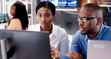 Poster - African Financial Data Analysts Using Dashboard On Screens