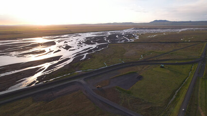 Wall Mural - Markarfljót is a river in the south of Iceland. The main sources for the river are the glaciers Mýrdalsjokull and Eyjafjallajokull. Midnight sun at the Markarfjot estuary.