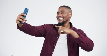 Poster - Studio, selfie and man with peace, gesture flex or hand pointing to phone with smile on white background. Smartphone, profile picture and influencer guy with emoji sign for social media, blog or post