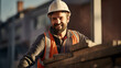 Portrait of happy construction bricklayer worker at construction site. Smiling bricklayer with safety vest and hat