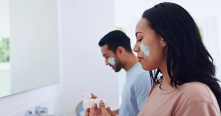 Wall Mural - Skincare, cream and couple cleaning in bathroom, mirror and morning routine for facial wellness. Beauty, dermatology and cosmetics, man and woman with lotion in reflection for face treatment in home.