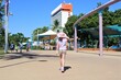 TOWNSVILLE, QLD - MAY 10 2023:Australian people walking on the Strand seaside foreshore in Townsville, Queensland, Australia.