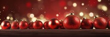 Christmas Banner With Red Baubles Or Balss On A Red And Yellow Background With Bokeh
