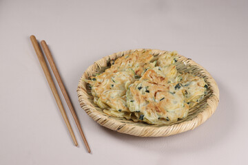 Wall Mural - Hobak Buchimgae or Cryspy Zucchini Pancake is Korean Zucchini Fritter.