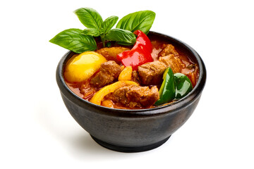 Hungarian goulash, pork stew, isolated on white background.