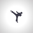 © Gunel - Karate icon. Karate kick Silhouette