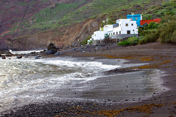 Wall Mural - Volcanic Black Beach and Colorful Fishing Houses, Roque Bermejo, Tenerife, Canary Islands, Spain