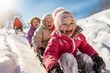 Happe Children sledding down a snowy hill. Winter vacation concept