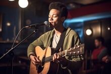 Shot Of A Young Man Performing At An Open Mic Event