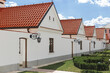 Row of modestly monks' houses in Camaldolese monastery in Wigry village, Poland