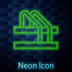 Sticker - Glowing neon line Bicycle parking icon isolated on brick wall background. Vector