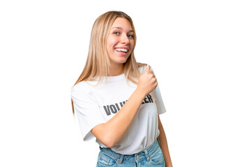 Wall Mural - Young volunteer woman over isolated chroma key background celebrating a victory