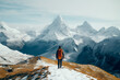 © Michael Schauer - Hiking in the mountains overlooking a vast alpine panorama