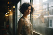 © Michael Schauer - Portrait of a brunette woman reflected in a window