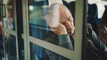 Old Man Sleeping While Traveling In Train Coupe, View Through Coupe Glass