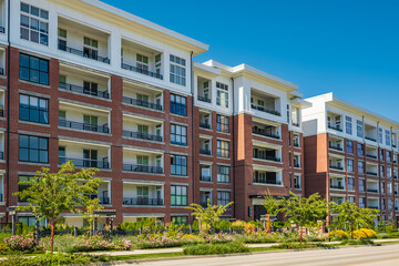 Wall Mural - Brand new apartment building on summer. Canadian modern residential architecture. Modern complex of apartment buildings