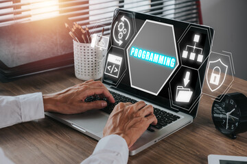 Wall Mural - programming concept, person hand typing keyboard computer on desk workplace with programming icon on