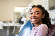 Portrait Of A Young African American Teenage Girl Smiling In The Dentists Office