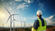 © Phoophinyo - A Renewable energy concept - engineer working at clean wind farm - renewable energy concept