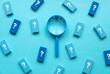 © MohamadFaizal - QnA or questions and answers concept. Blue magnifying glass with question symbol on wooden cube over a blue background.